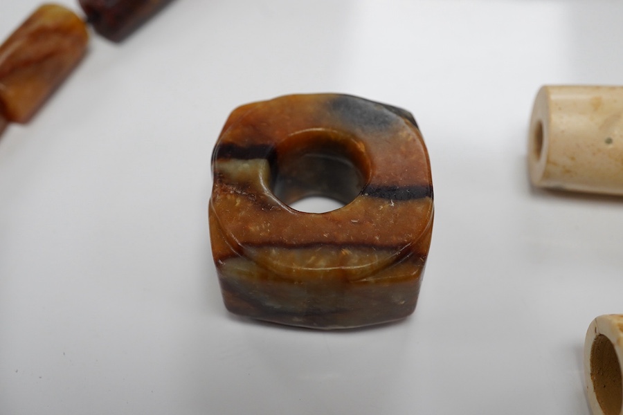 A collection of Chinese hardstone beads